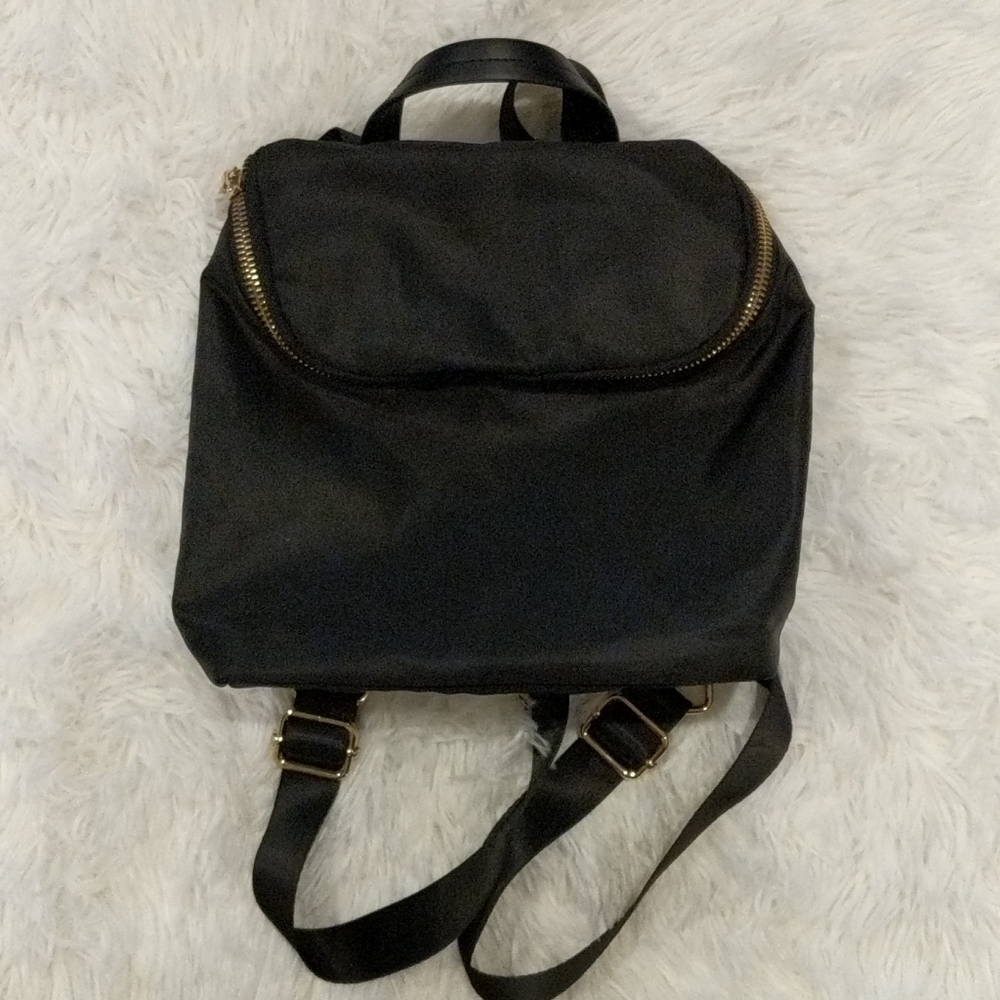 A New Day small backpack/crossbody purse